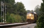 CSX C40-8Ws 7670 and 7618 haul autoracks past the signals at Flat Shoals Road